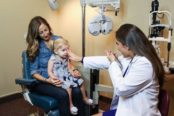 Photo of a pediatric exam being done